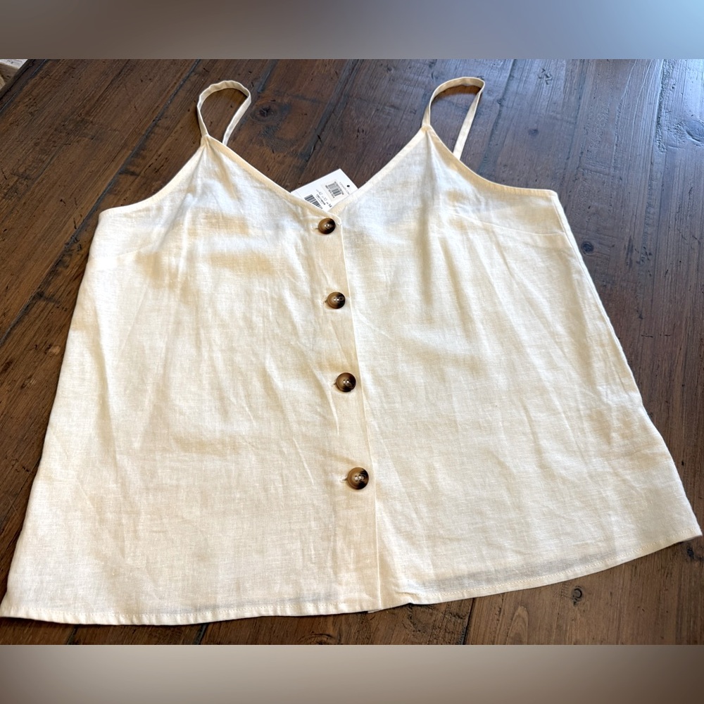 Topshop ivory woman’s top with spaghetti straps. Front button down. NWT